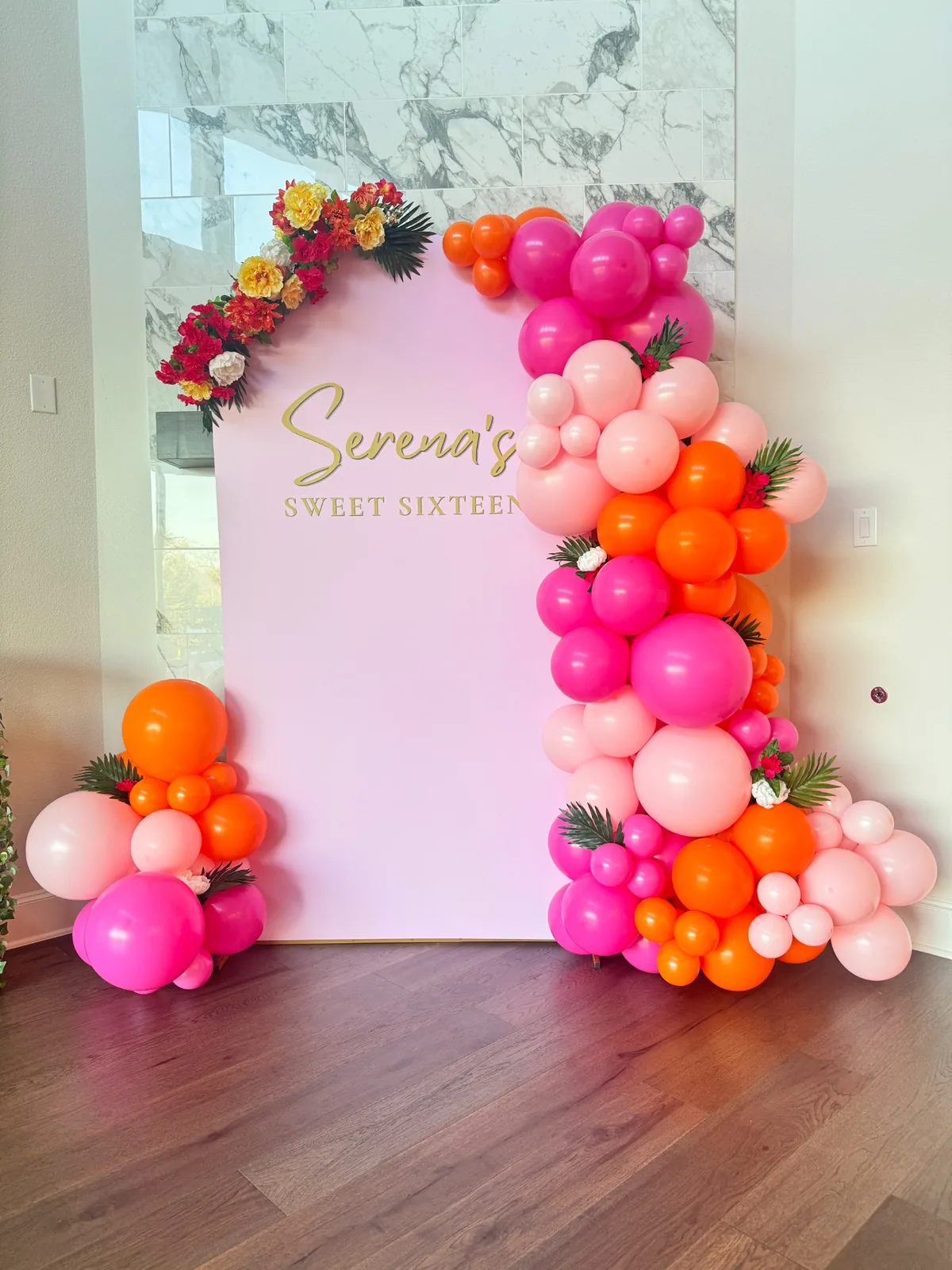 Pink Serena's Sweet Sixteen custom backdrop with pink, orange and blush balloon garland